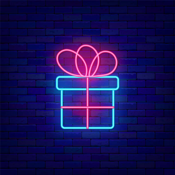 istock Gift box with bow neon icon. Giveaway Happy Birthday concept. Outer glowing effect banner. Vector stock illustration 1361771087