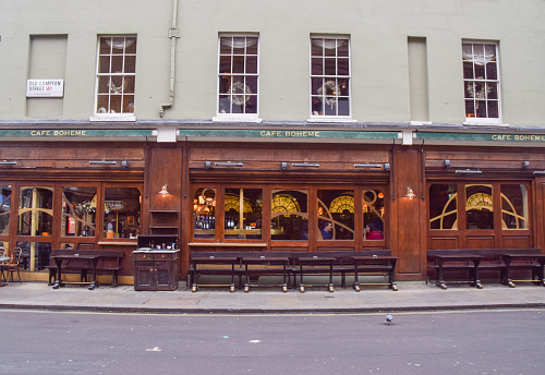 London, UK - December 17 2021: Cafe Boheme on Old Compton Street, exterior view with empty tables