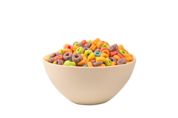 istock Colorful rings cereal spill out into a bowl. Breakfast. Isolated. 1361775274