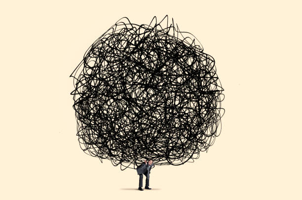 istock Man Carries Large Burden On His Shoulders 1361776989