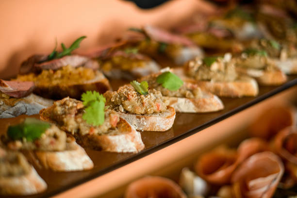 istock Selective focus of delicious appetizing bruschettas on a tray 1361777489