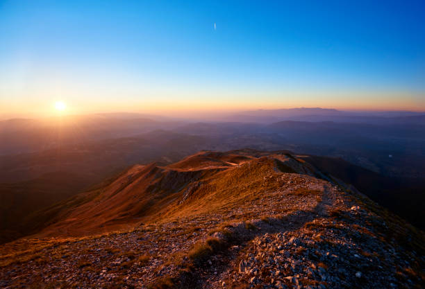 istock Dreamy sunset over the Mountain 1361777525