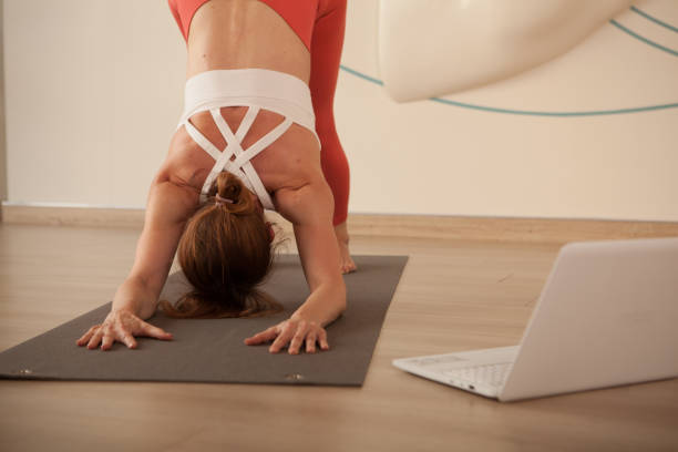 istock Mature woman practicing yoga 1361778209