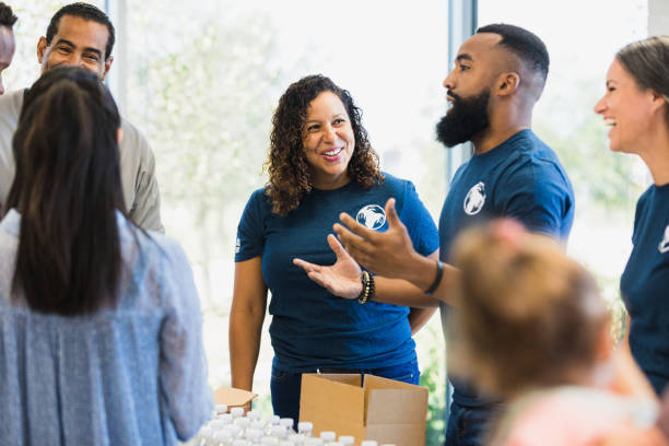 istock Multi-ethnic group receives training at food bank event 1361778762
