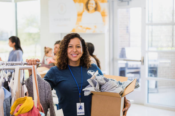 istock Volunteer works during charity event 1361779216