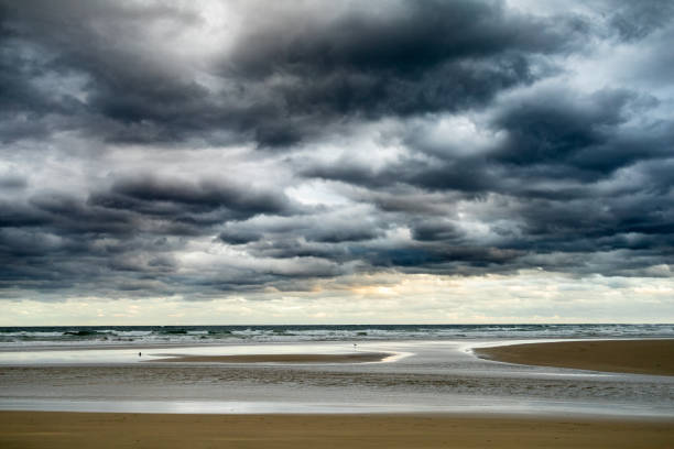 istock Storm clouds on the horizon over ocean 1361784790