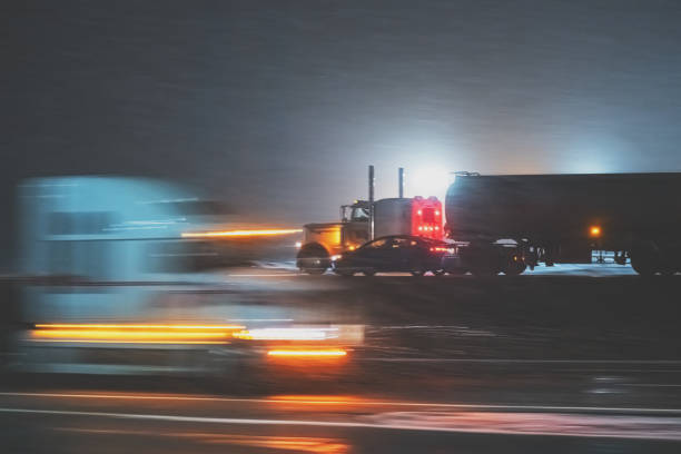 istock Semi Trucks on Highway in Winter 1361785542