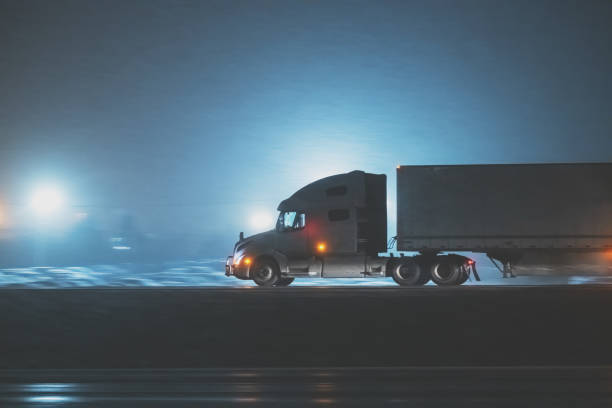 istock Semi Truck on Highway in Winter 1361785544