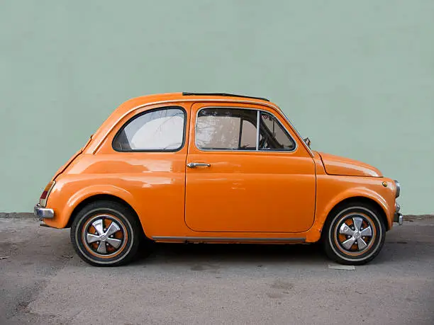 Photo of Fiat 500 orange.
