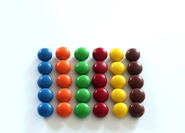 Hard shell chocolate candy.  Multi-colored. stock photo