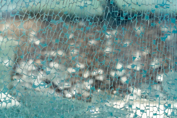 istock chaotic pattern cracked glass, concept of vandalism 1361793218