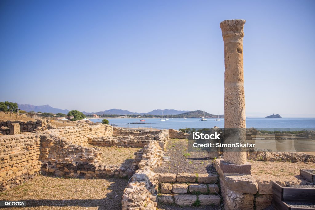 Ancient ruins of Nora, Sardinia, Italy View of Nora, archaeologic area along the coast, Sardinia, Italy. Italy Stock Photo