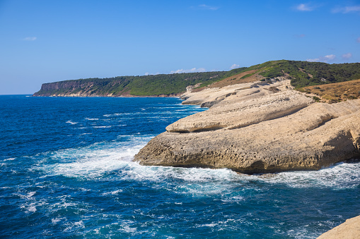 View of a beautiful cave along the coast in summertime, Sardinia, Italy.