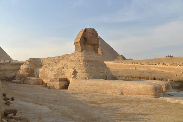 The pyramid at Giza in the desert and sphinx. Giza; Egypt: The pyramid at Giza in the desert and sphinx. pyramid giza pyramids close up egypt stock pictures, royalty-free photos & images