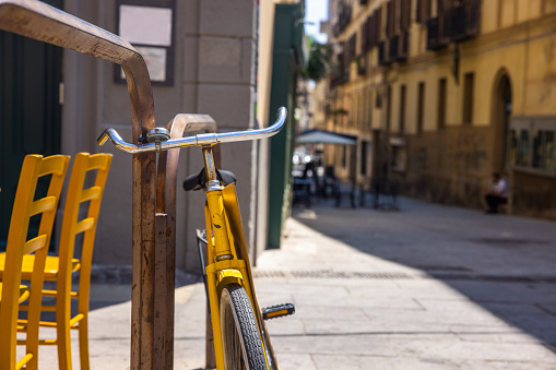 View of a bicycle parked in Cagliari old town, Sardinia, Italy.
