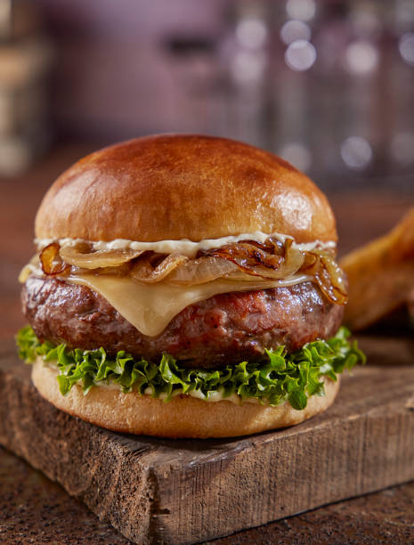 istock hamburger on wooden plate 1361800673