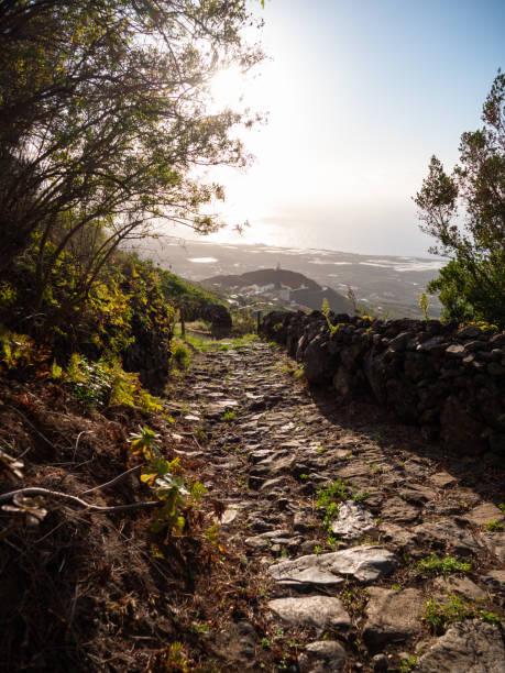 istock Ancient stone path that goes down to the village 1361802690
