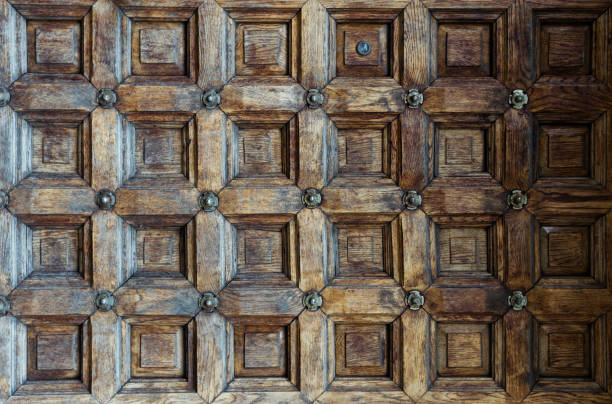 istock Vintage carved brown wood background 1361805129