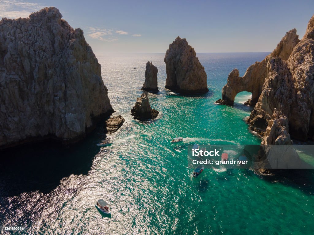 Aerial view looking down at the famous rock formations and Arch of Cabo San Lucas, Baja California Sur, Mexico Darwin Arch glass-bottom boats viewing sea life Cabo San Lucas Stock Photo