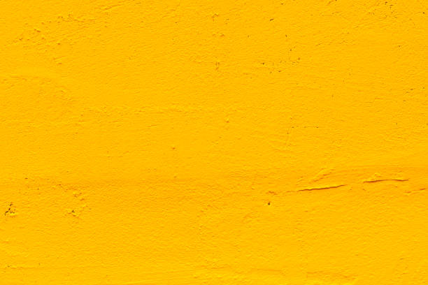 istock Yellow grunge background. Old plastered wall 1361814264