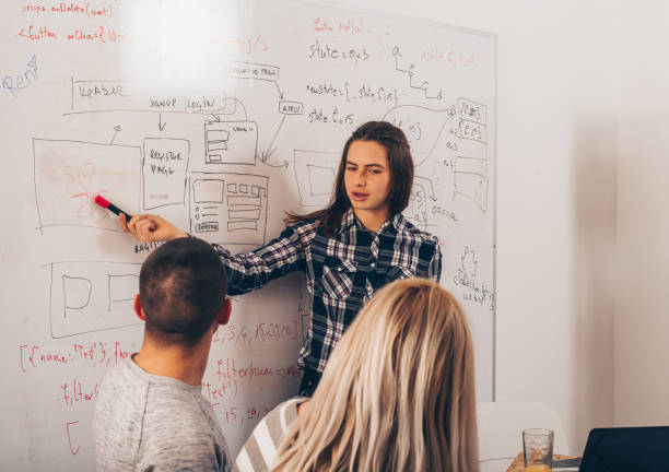 istock Young business girl having presentation in office 1361815981