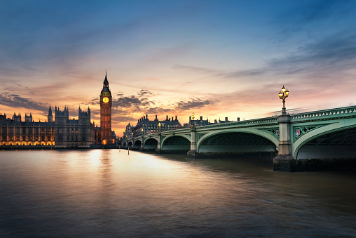 View of Westminster Bridge over the River Thames with Big Ben and the Palace of Westminster, home of the UK Parliament in London.