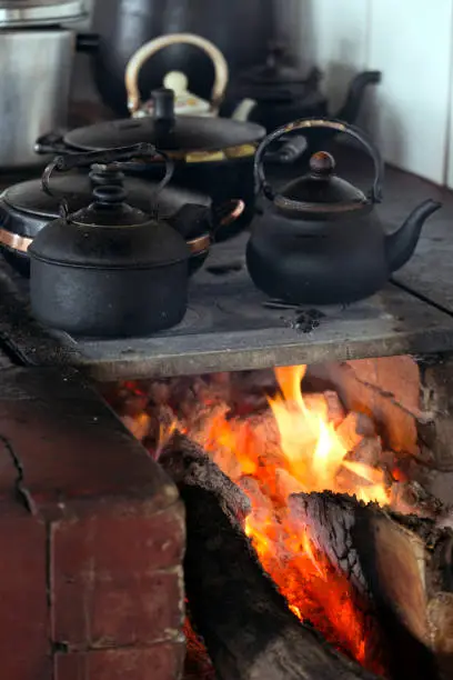 Photo of Iron pans over wood stove