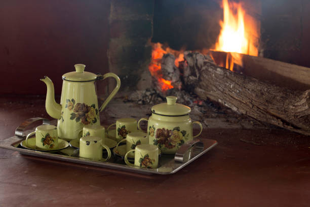 istock Coffee pot in the wood stove 1361818043