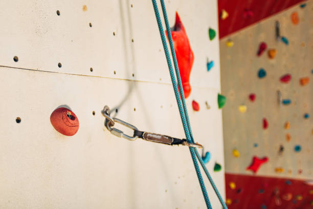 istock White climbing wall with colorful rocks 1361821433