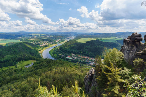 View from Lilienstein over the valley of the River Elbe with rock formation in foreground, Saxon Switzerland, Germany View from Lilienstein over the valley of the River Elbe with rock formation in foreground, Saxon Switzerland, Germany elbe valley stock pictures, royalty-free photos & images