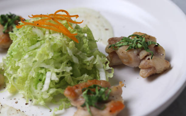 istock Dakgalbi grilled with salt and pepper with napa cabbage salad. 1361834110