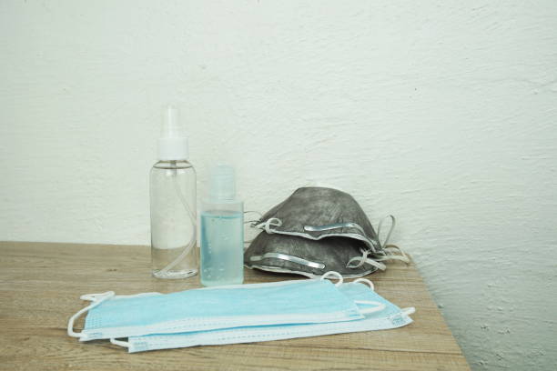 istock Surgical Mask with alcohol gel and spray 1361843608