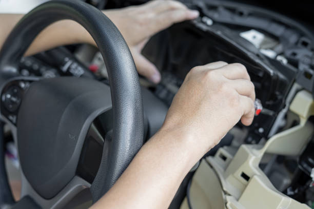 istock Close up hand Technician use screw driver remove and check car speedometer check the point of damage and check for repair in car service shop 1361845078