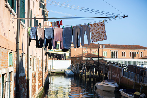 Italian tradition of drying laundry on the street in cities.