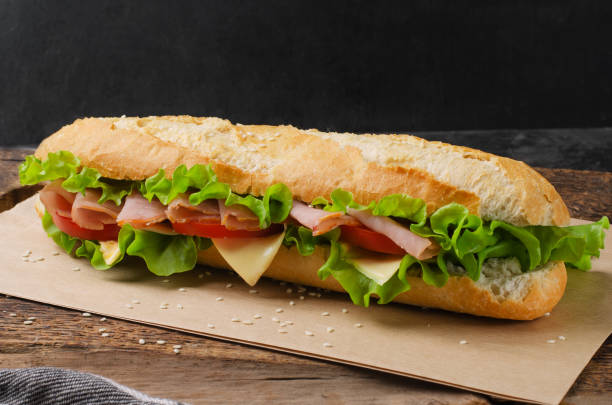 istock Sandwich with ham, tomato and cheese 1361861260