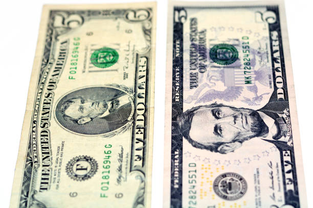 istock 5 five dollars bill banknote features image of president Abraham Lincoln on obverse and Lincoln memorial on reverse 1361861893