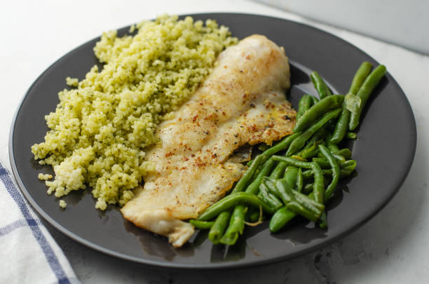 istock Hake fish, green beans and couscous 1361862442