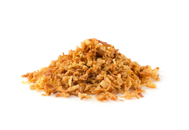istock Pile of fried gold onion or shallots isolated 1361862721