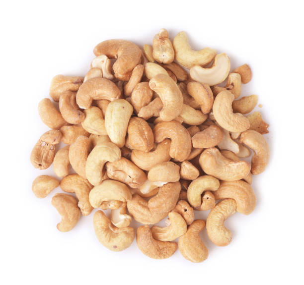 istock Heap of cashew nuts isolated 1361862767