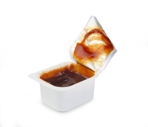 istock Open BBQ fast food dip packet isolated 1361862789