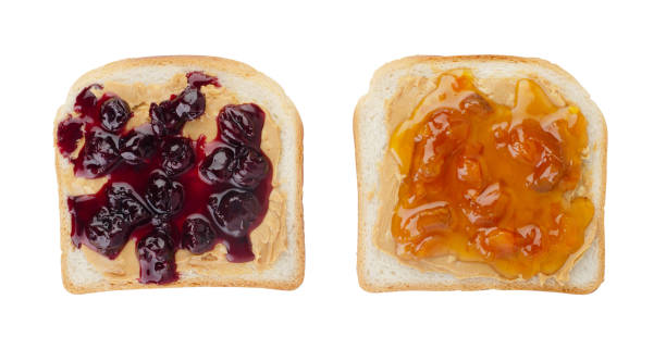 istock Toasts with butter peanut and cherry and apricot jam. 1361862794