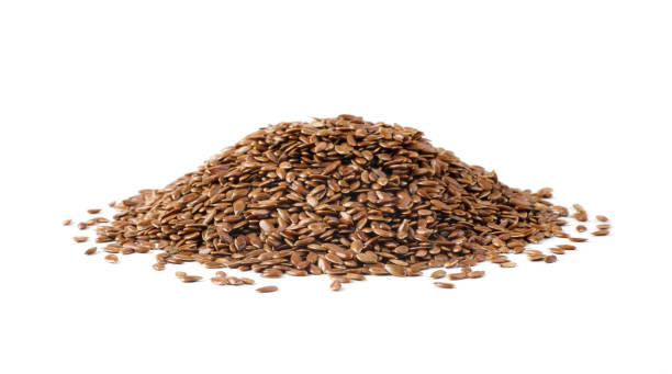 istock Pile of flax seeds isolated on a white 1361862986