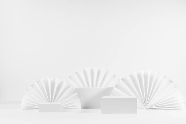 istock Elegant light white stage with three rectangle podiums in modern fashion style with round asian paper fans, mockup for presentation cosmetic product, advertising, design, copy space, front view. 1361867276