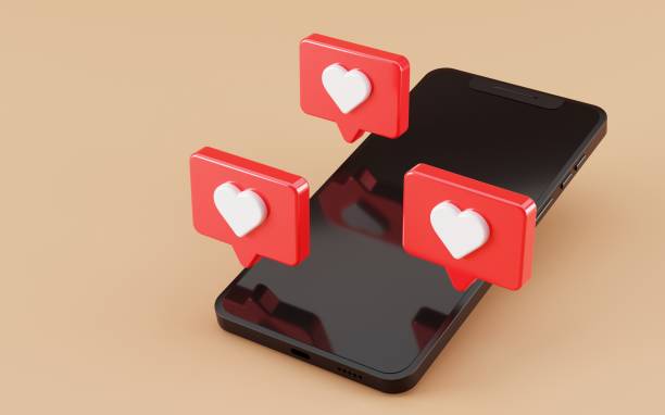 istock Smartphone screen with floating love icon 1361869789