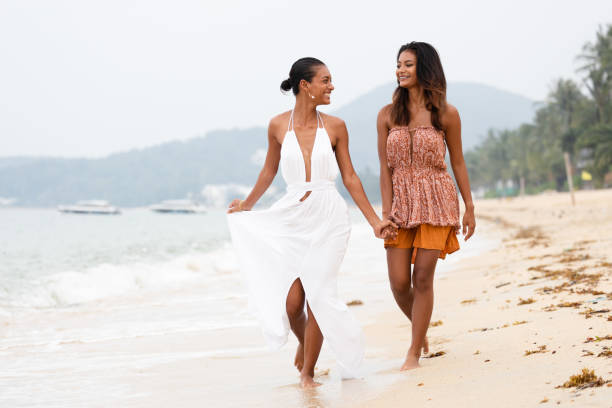 istock Tanned women 1361875103