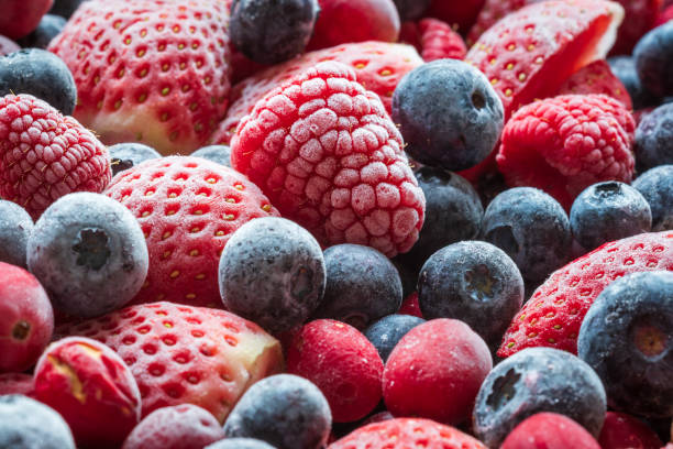 istock frozen mix strawberries blueberries raspberries and cranberries closeup 1361876333