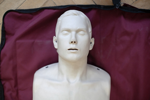 Mannequin head. Fabric mannequin. Figure of a man made of fabric. Face without details.