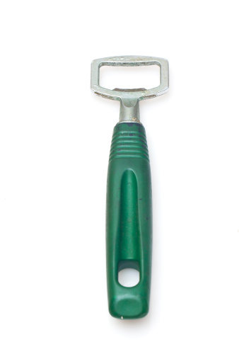 It is a used bottle opener which is green in color.