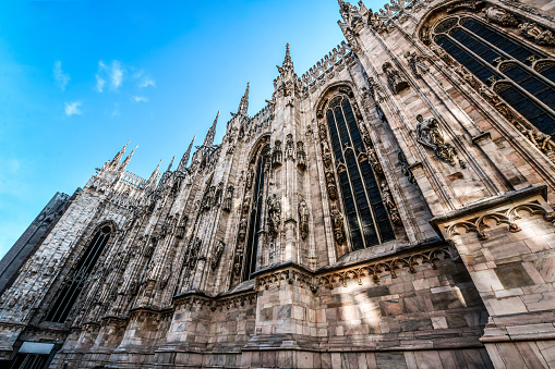 Side View Of Architectural Features And Windows Of Duomo In Milan, Italy