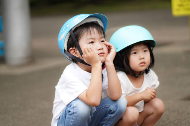 istock Children waiting in line 1361888978